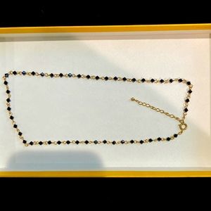 Black stone gold necklace